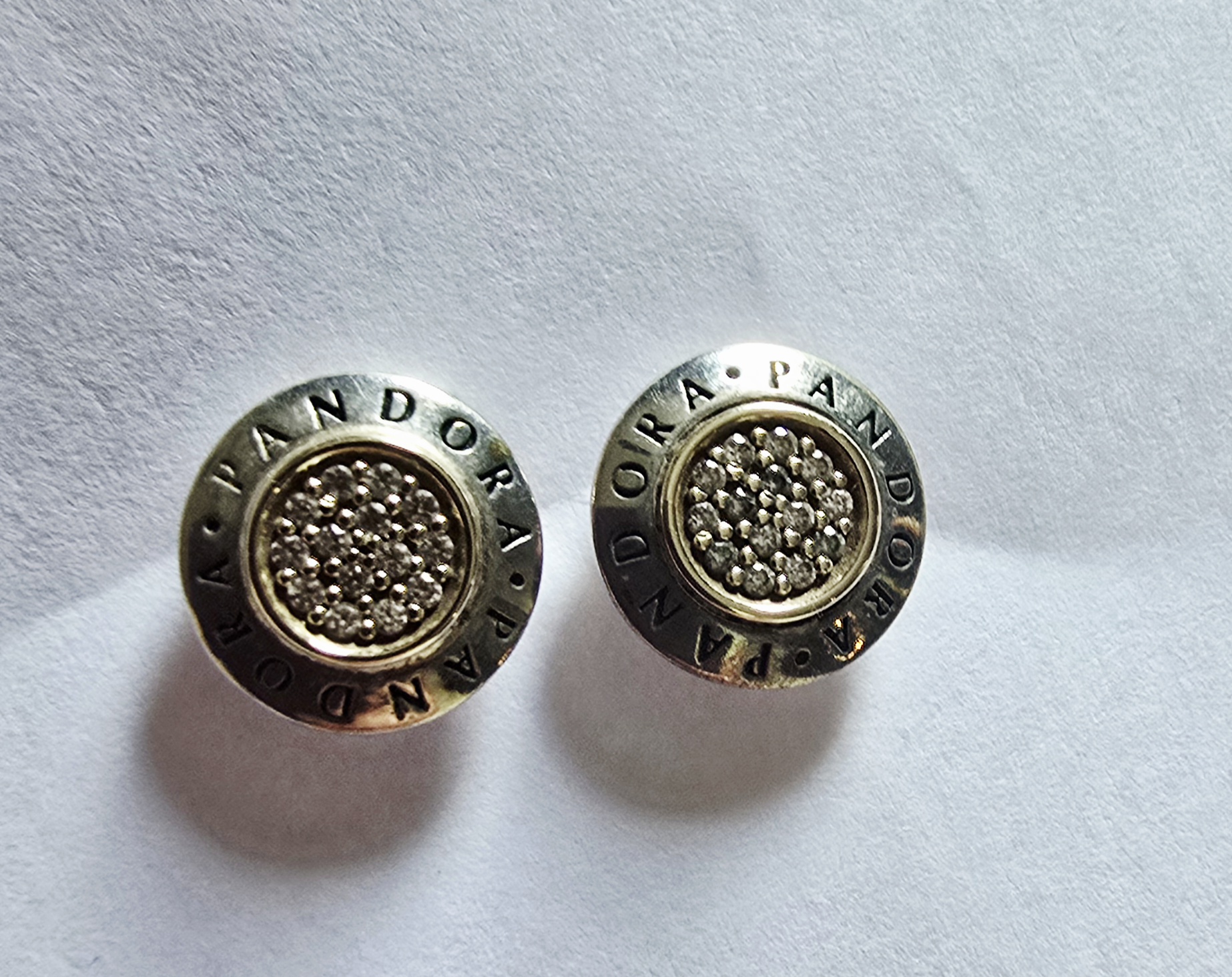 Aretes de Pandora oro y plata